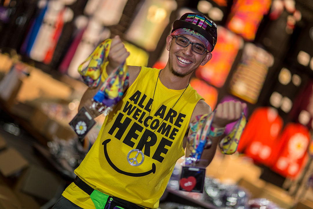A vendor holding lanyards